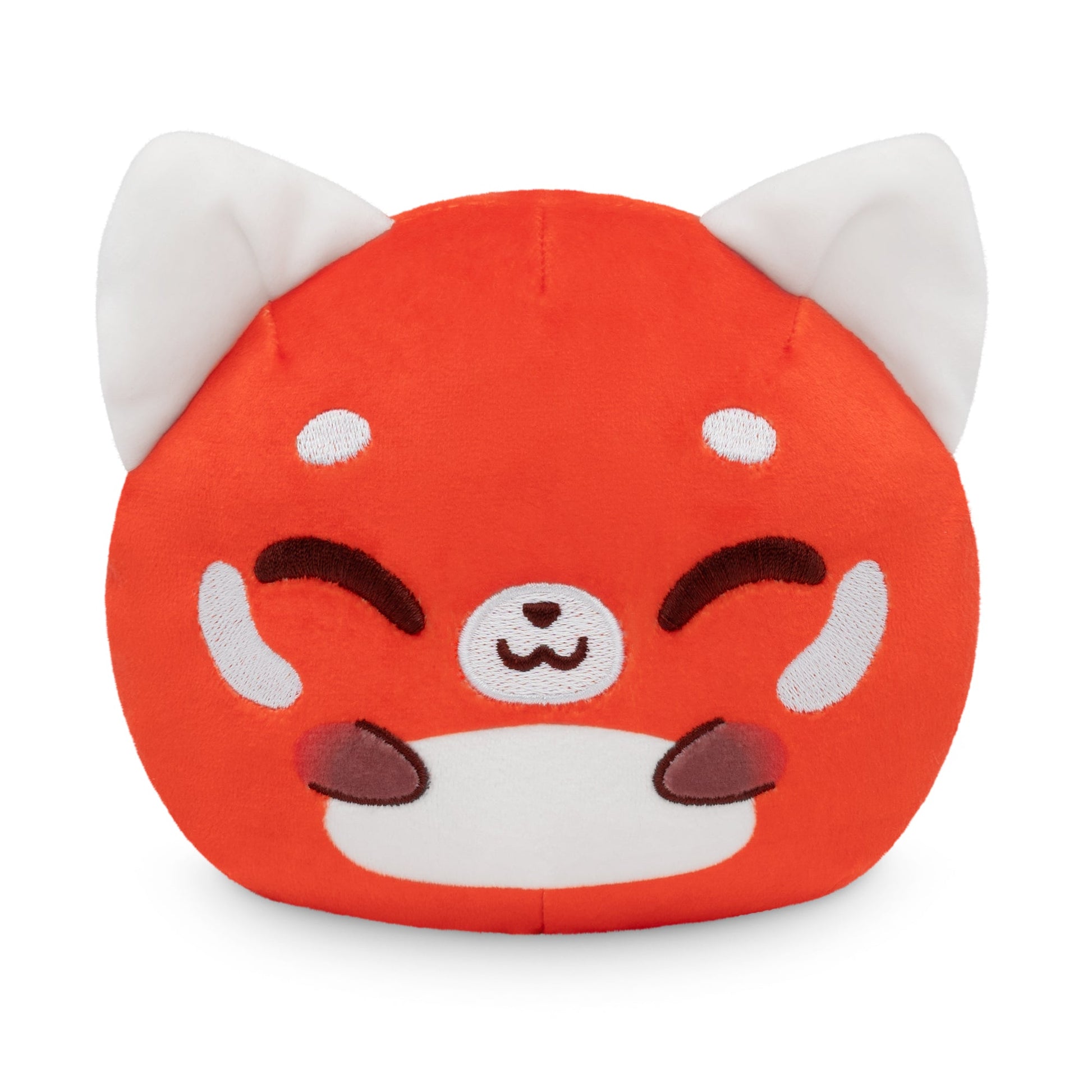 Introducing the Plushiverse Panda Pals 4" Reversible Plushie by TeeTurtle: a charming, round, orange plush toy accented with white and red. Designed to resemble an adorable, smiling animal face with closed eyes and ears, this soft and cuddly companion is perfect for snuggling.