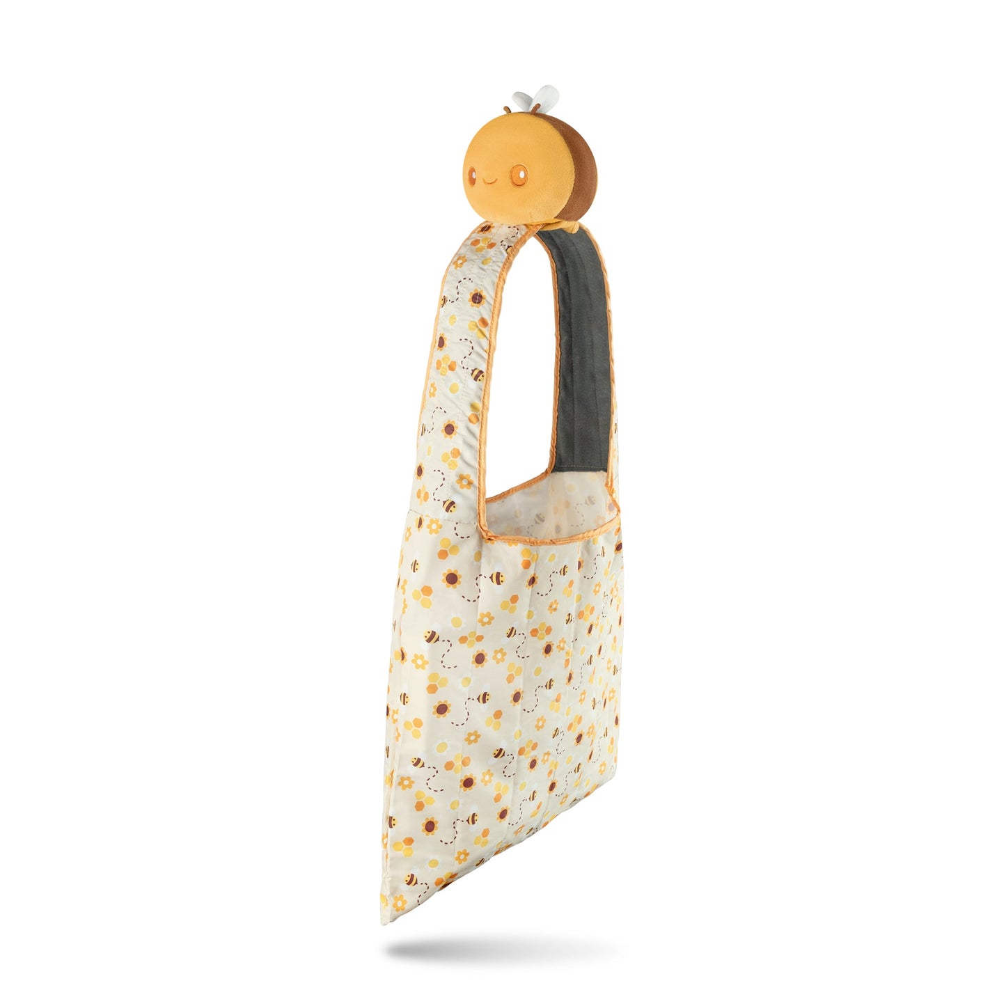A Plushiverse Honeybee Plushie Tote Bag by TeeTurtle, with orange polka dots on a white background.