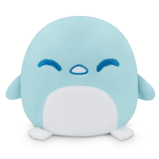 A blue and white Plushiverse Snowy Penguin Plushie Tote Bag sitting on a white surface, perfect for TeeTurtle plushies collectors.