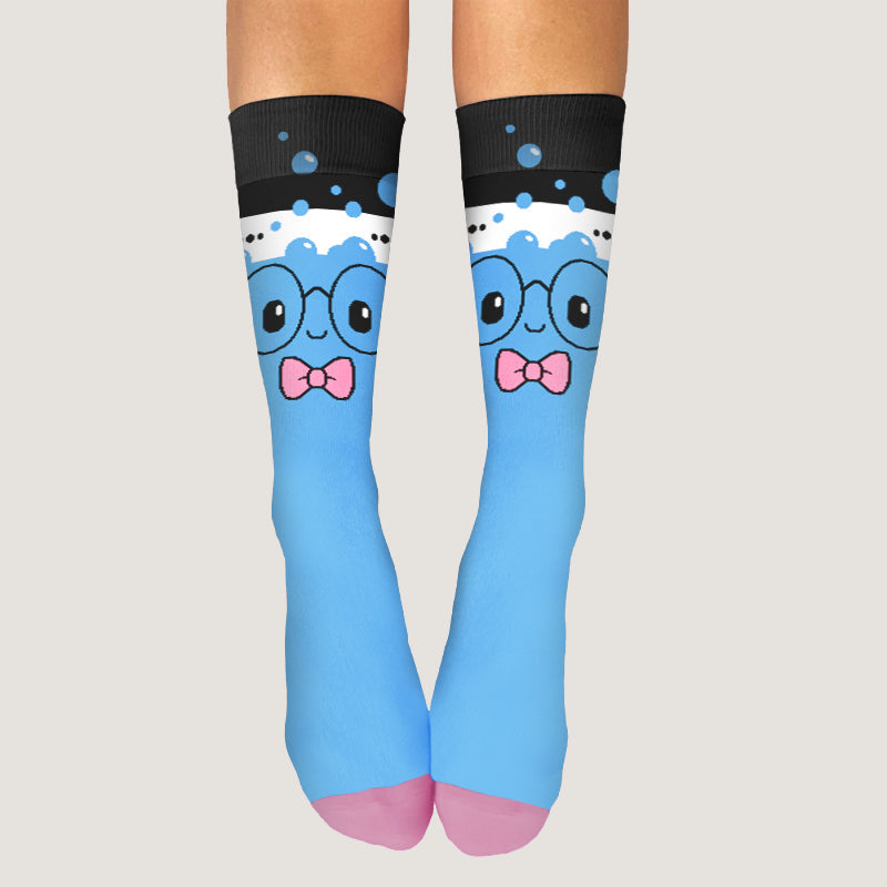 A woman wearing a pair of TeeTurtle's Doctor Beaker Socks.